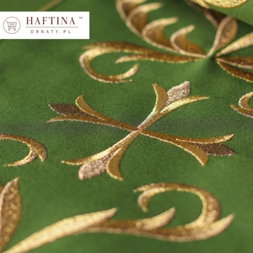 zielony materiał haftowany w złote wzory