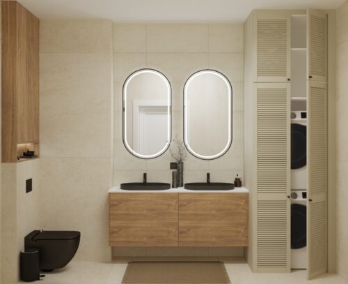 łazienka w kolorach beżu, drewniane meble, dwa owalne lustra nad umywalką