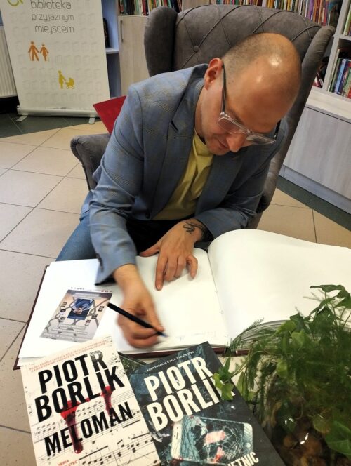 W bibliotece z Piotrem Borlikiem